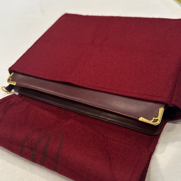 Authentic Cartier clutch bag with authenticity card